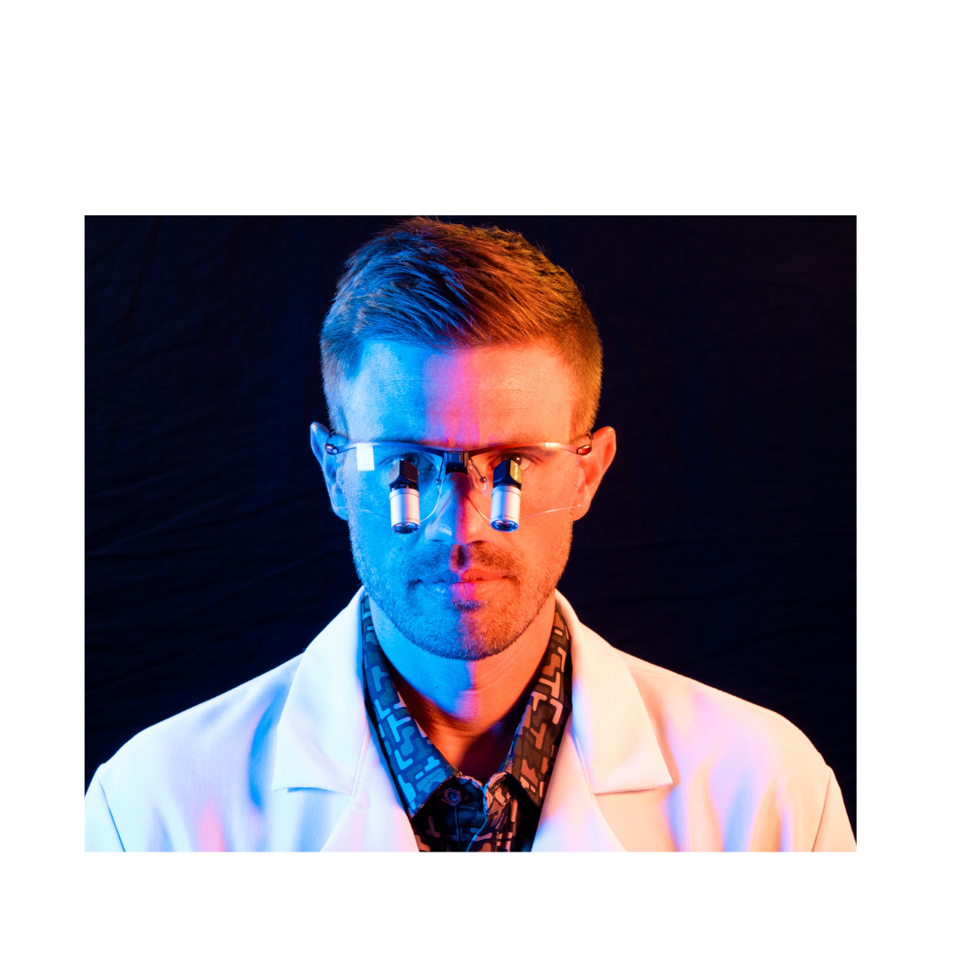 Dentist wearing the Lumadent ErgoPrism loupes and SporTi frames.
